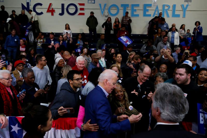 Democratic U.S. presidential candidate and former U.S. Vice President Joe Biden meets with audience members at the end of a campaign event at Saint Augustine's University in Raleigh