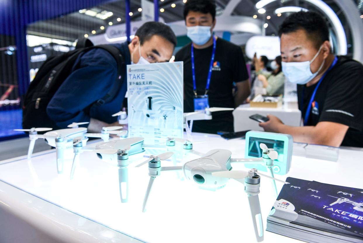 Visitors learn about drones at the 22nd China Hi-Tech Fair (CHTF) held in Shenzhen, south China's Guangdong Province, Nov. 11, 2020. Photo: Xinhua/Mao Siqian via Getty Images