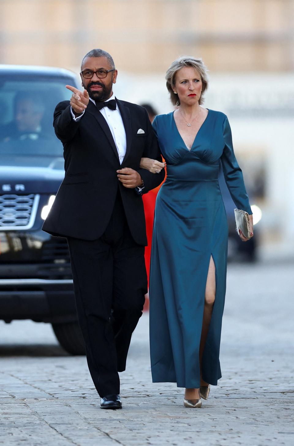 British Foreign Secretary James Cleverly and his wife Susannah Cleverly arrive to attend a state dinner in honor of Britain's King Charles and Queen Camilla at the Chateau de Versailles (REUTERS)