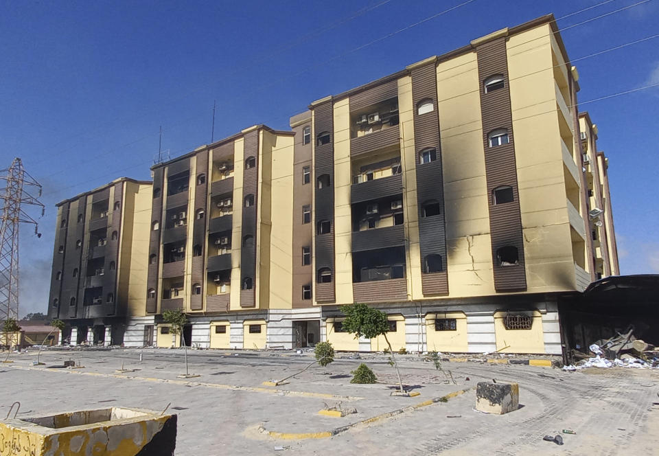 Libya's charred parliament building is seen in Tobruk, Libya, Saturday, July 2, 2022. Hundreds of protesters marched in the streets of the capital Tripoli and other Libyan cities on Friday, with many attacking and setting fire to government buildings, including the House of Representatives in the eastern city of Tobruk. (AP photo/