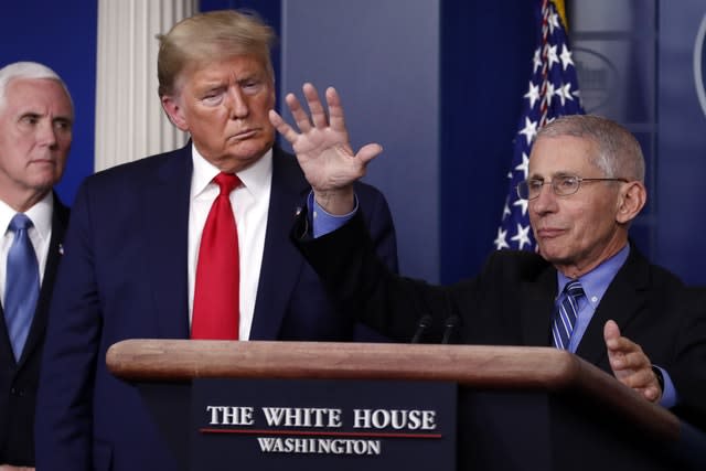 US President Donald Trump and vice president Mike Pence with Dr Anthony Fauci