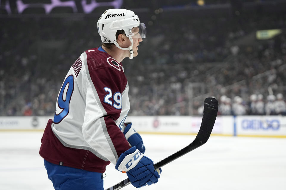 Colorado Avalanche center Nathan MacKinnon celebrates after scoring during the first period of an NHL hockey game against the Los Angeles Kings Wednesday, Oct. 11, 2023, in Los Angeles. (AP Photo/Mark J. Terrill)