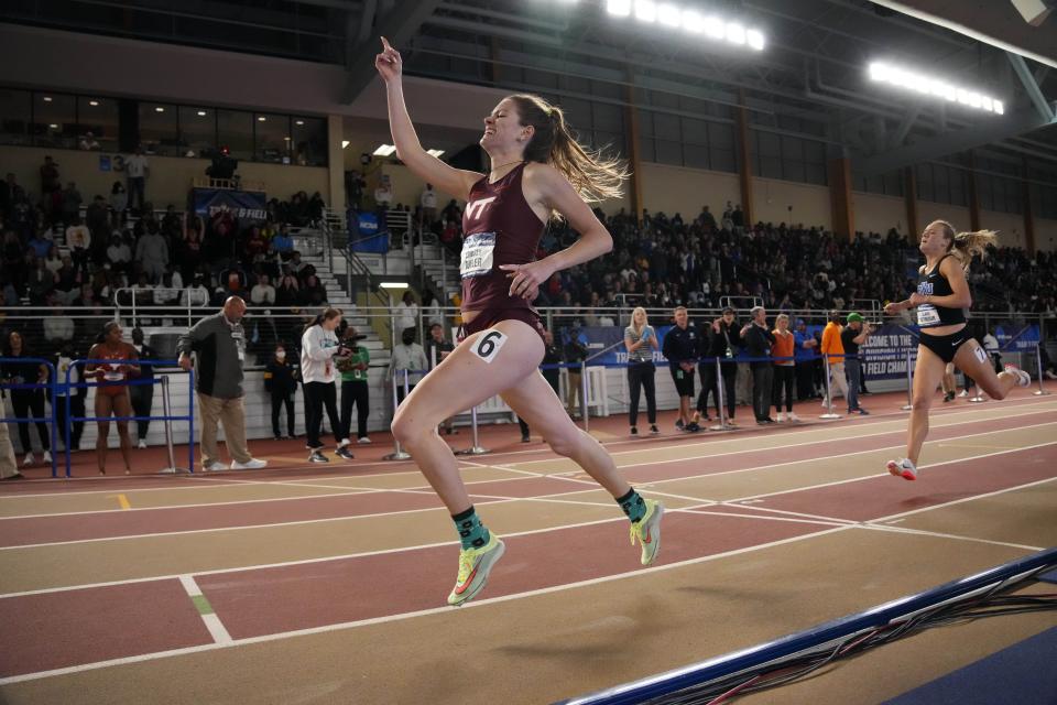 Corning-Painted Post graduate Lindsey Butler of Virginia Tech celebrates after winning the women's 800m in 2:01.37 during the NCAA Indoor Track and Field championships at the CrossPlex in Birmingham, Alabama, on March 12, 2022.