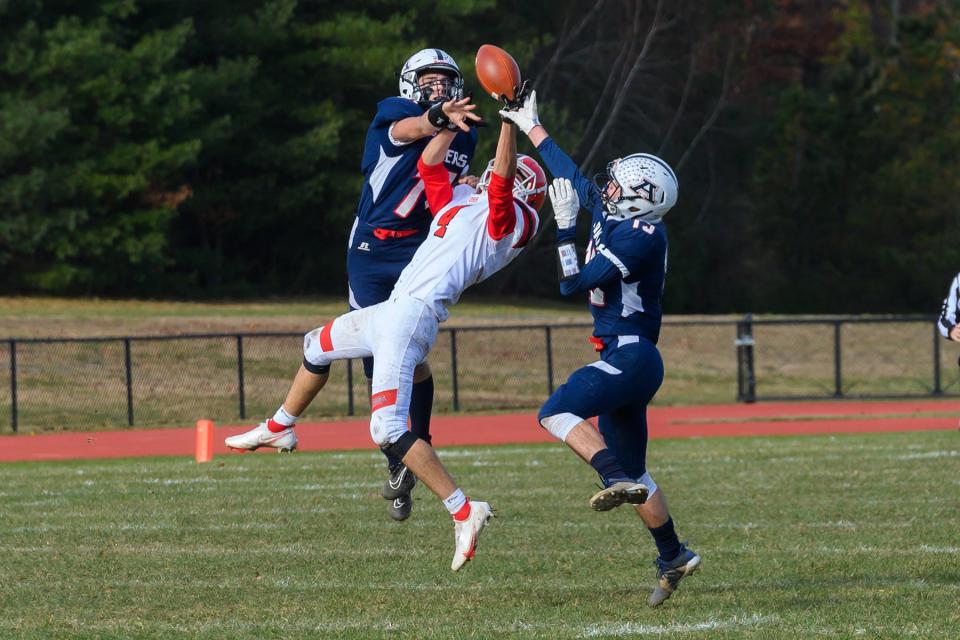 Apponequet's Chris Murray and Tanner Audyatis break up a pass intended for ORR's Stephen Old.