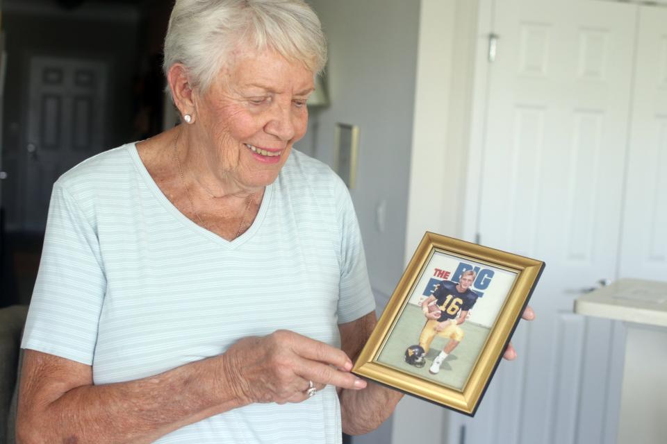 Janet Gray holds a picture of her son Chris Gray, a former Manalapan High School football standout who died in the Twin Towers on 9/11