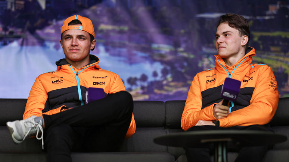Lando Norris (left) and Oscar Piastri answer questions leading up to the 2023 Australian Grand Prix, which took place on April 2.