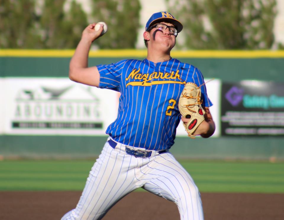 Nazareth's Trent Gerber delivers a pitch during the first game of the Region I-1A baseball championship series in Woodrow on Friday, May 27, 2022.