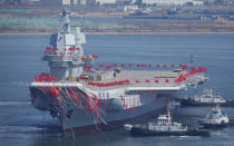 China's first domestically built aircraft carrier is seen during its launching ceremony in Dalian, Liaoning province, China. REUTERS/Stringer