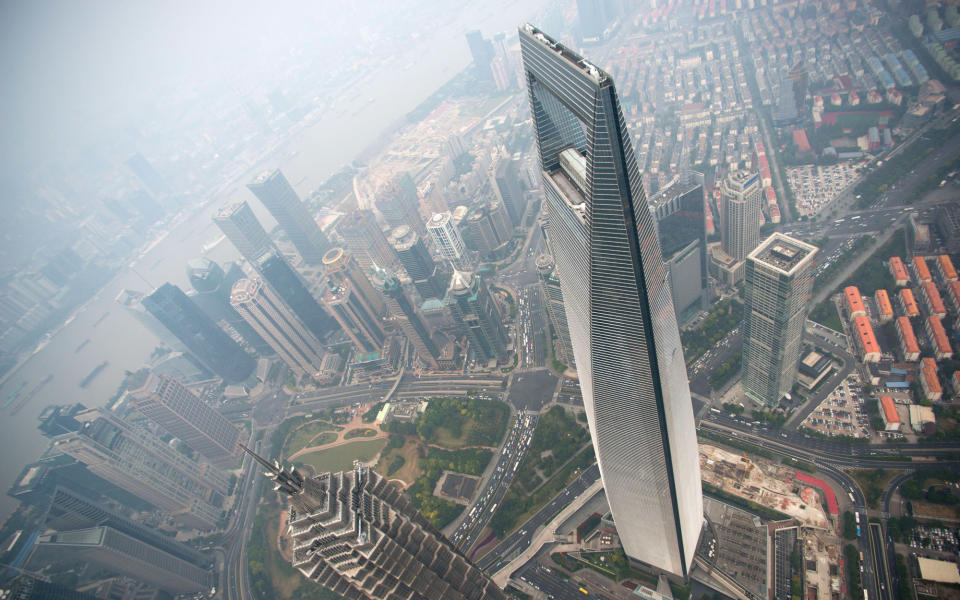 <p>Or as we like to call it, The Bottle Opener—though it wasn’t constructed to look like one. According to <a rel="nofollow noopener" href="http://skyscrapercenter.com/building/shanghai-world-financial-center/131" target="_blank" data-ylk="slk:The Skyscraper Center;elm:context_link;itc:0;sec:content-canvas" class="link "><em>The Skyscraper Center</em></a>, the tower was “shaped by the intersection of two sweeping arcs and a square prism—shapes representing ancient Chinese symbols of heaven and earth, respectively.” So that explains the unique design. The tower also hosts the world’s second-highest hotel, the <a rel="nofollow noopener" href="http://www.travelandleisure.com/travel-guide/shanghai/hotels/park-hyatt-shanghai" target="_blank" data-ylk="slk:Park Hyatt Shanghai;elm:context_link;itc:0;sec:content-canvas" class="link ">Park Hyatt Shanghai</a>.</p>