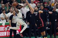 Miami Heat's Max Strus (31) defends against Boston Celtics' Jaylen Brown (7) during the second half of Game 3 of the NBA basketball Eastern Conference finals playoff series Saturday, May 21, 2022, in Boston. (AP Photo/Michael Dwyer)