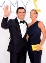 Ty Burrell and guest arrive at the 64th Primetime Emmy Awards at the Nokia Theatre in Los Angeles on September 23, 2012.