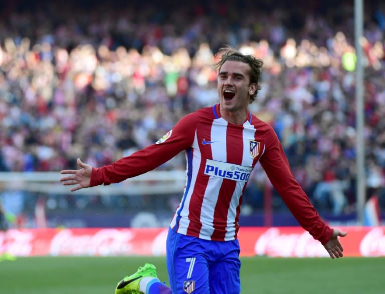 Atletico Madrid's forward Antoine Griezmann celebrates after scoring on March 19, 2017