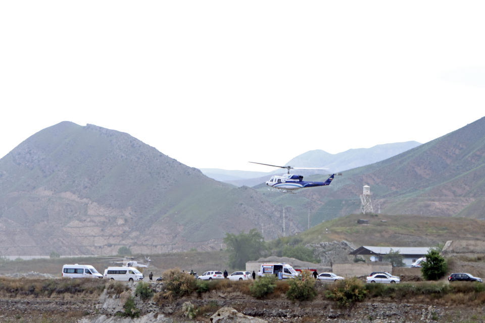 In this photo provided by Islamic Republic News Agency, IRNA, the helicopter carrying Iranian President Ebrahim Raisi takes off at the Iranian border with Azerbaijan after President Raisi and his Azeri counterpart Ilham Aliyev inaugurated dam of Qiz Qalasi, or Castel of Girl in Azeri, Iran, Sunday, May 19, 2024. A helicopter carrying President Raisi suffered a "hard landing" on Sunday, Iranian state media reported, without elaborating. (Ali Hamed Haghdoust/IRNA via AP)