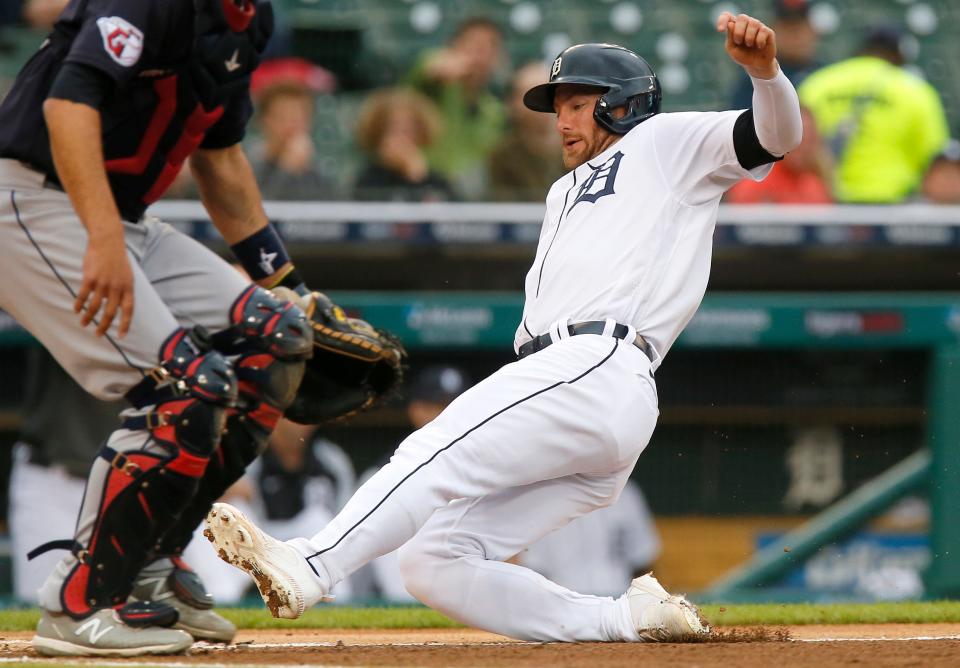 Tigers right fielder Robbie Grossman scores against the Guardians on a single by Javier Baez during the first inning on Thursday, May 26, 2022, at Comerica Park.