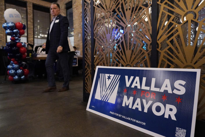 A supporter arrives for Chicago mayoral candidate Paul Vallas' election night event in Chicago, Tuesday, Feb. 28, 2023. (AP Photo/Nam Y. Huh)