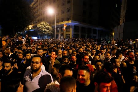 Demonstrators gather during a protest over deteriorating economic situation in Beirut