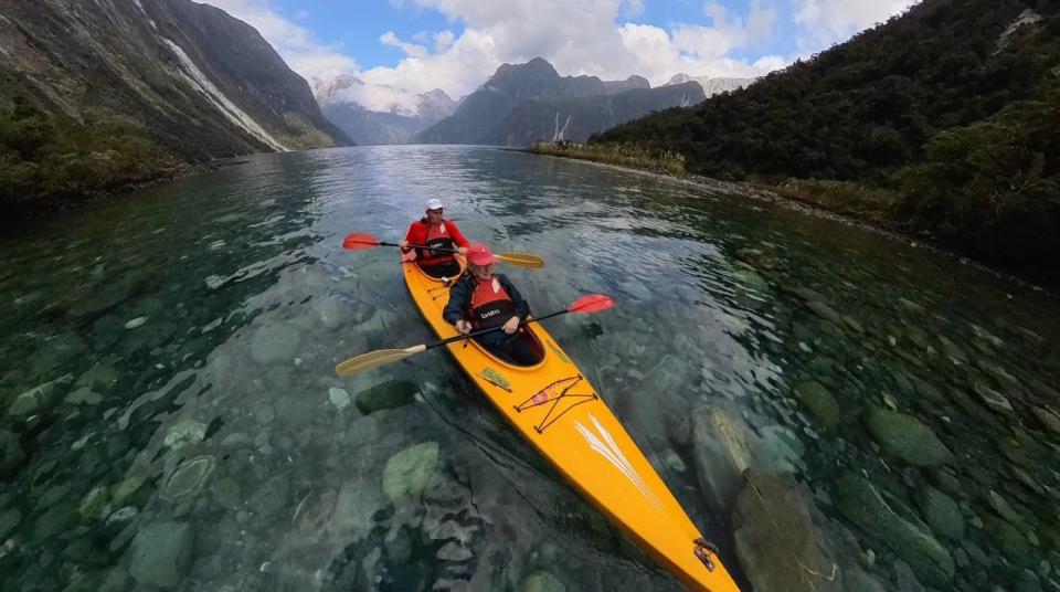 John and Beverly Martin kayaking in New Zealand.