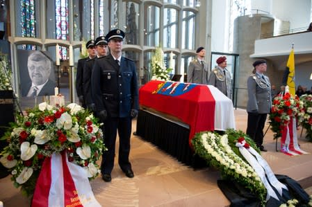 FILE PHOTO: An honour guard made of Police and Federal Armed Force officers stands next to the coffin of the Kassel District President, Walter Luebcke, who was shot, during his funeral at the St. Martin Church in Kassel