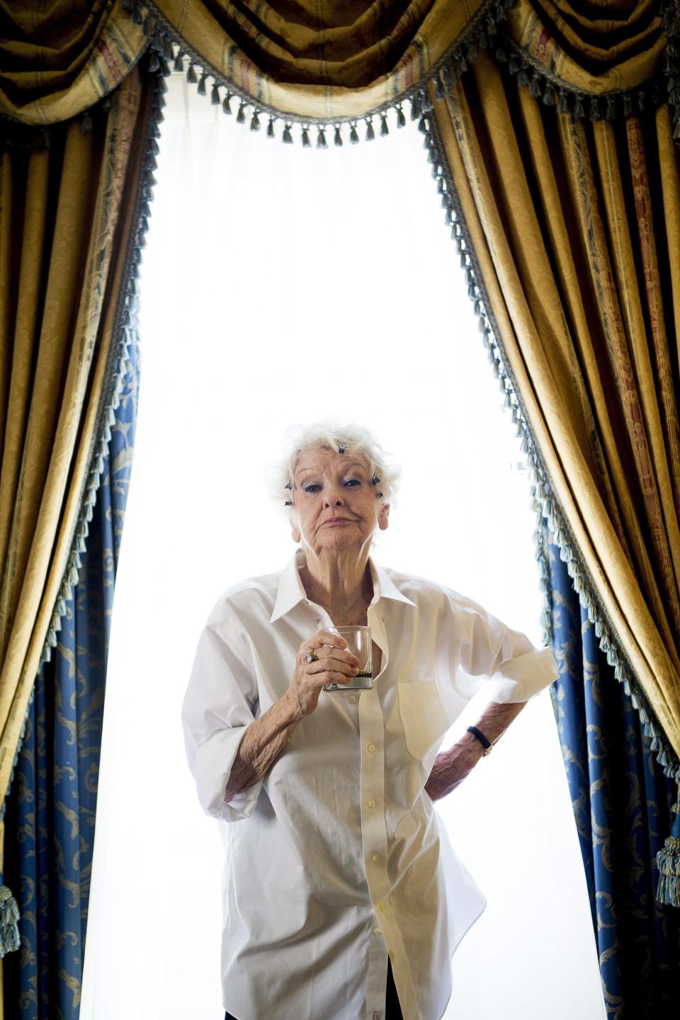 FILE - This Sept. 11, 2012 file photo shows actress Elaine Stritch poses for a photograph during the 2012 Toronto International Film Festival in Toronto. Stritch discusses her experience being documented for "Elaine Stritch: Shoot Me," a film at the Tribeca Film Festival. (AP Photo/The Canadian Press, Frank Gunn, file)