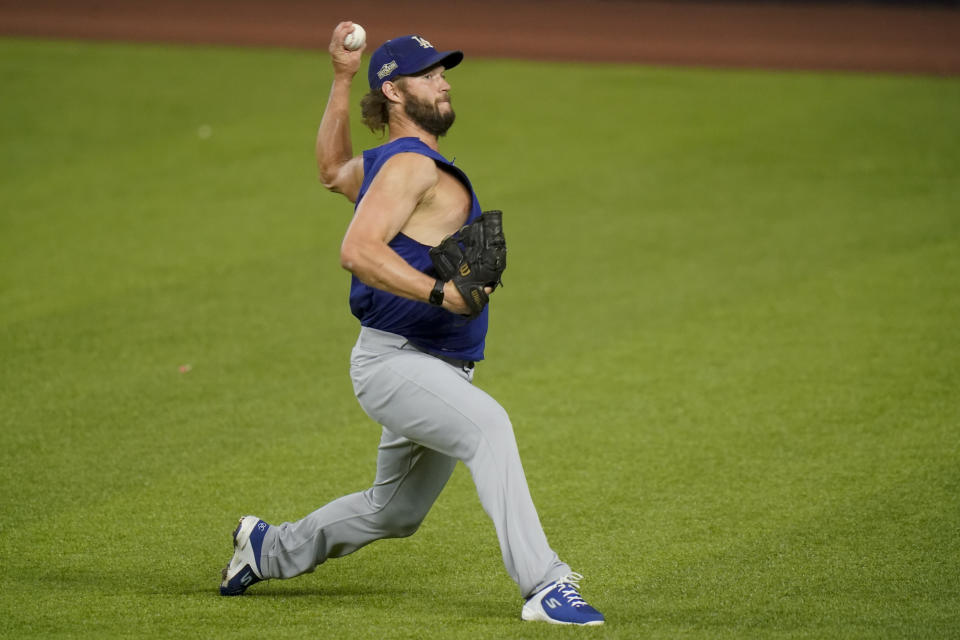 Los Angeles Dodgers starting pitcher Clayton Kershaw works out before Game 3 of a baseball National League Championship Series against the Atlanta Braves Wednesday, Oct. 14, 2020, in Arlington, Texas. (AP Photo/Eric Gay)
