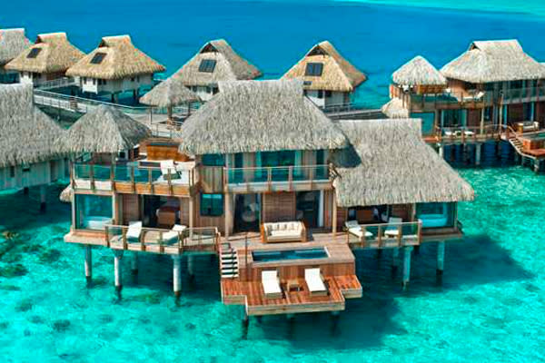 <div class="caption-credit"> Photo by: Hilton Bora Bora</div><div class="caption-title">1. Presidential Suite At Hilton Bora Bora In Nui, Tahiti</div><p> Overwater bungalows are du riguer in French Polynesia, but not many can boast that they have two stories and an ultra-secluded position at the edge of a long pontoon. This two-bedroom suite offers all that, plus a private pool, an outdoor Jacuzzi, a dedicated in-room spa area, two living rooms and three bathrooms. Décor is traditional Tahitian, with natural woods and tropical prints. Nothing beats a morning cannonball into the multi-blue toned water, just off your sprawling deck. For more info, visit <a rel="nofollow noopener" href="http://www.bridalguide.com/planning/wedding-reception/fall-wedding-ideas" target="_blank" data-ylk="slk:hilton.com;elm:context_link;itc:0;sec:content-canvas" class="link ">hilton.com</a>. </p> <p> <b>Related: <a rel="nofollow noopener" href="http://www.bridalguide.com/destination-weddings/wedding-caribbean/tahiti-honeymoon" target="_blank" data-ylk="slk:The Ultimate Tahiti Honeymoon;elm:context_link;itc:0;sec:content-canvas" class="link ">The Ultimate Tahiti Honeymoon</a></b> </p>