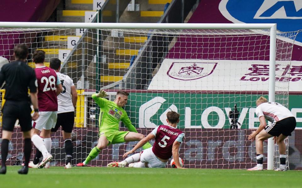 James Tarkowski scored Burnley's opener just before half-time - REUTERS