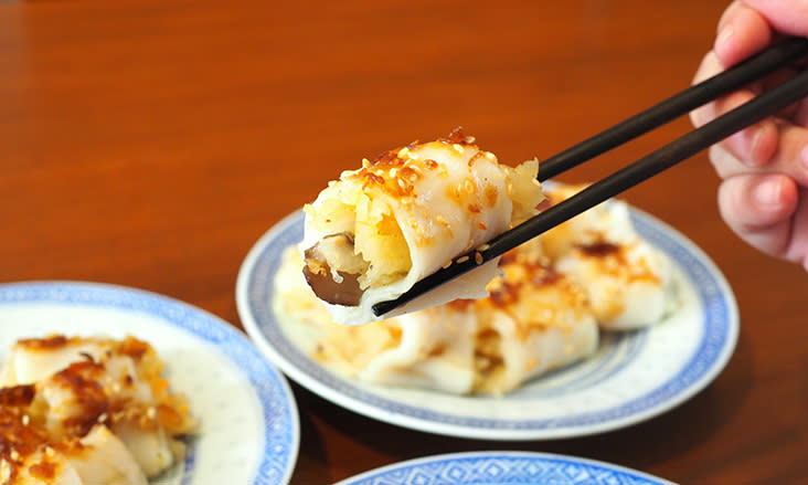 The rice rolls are stuffed with shredded carrots and yam bean cooked in chicken stock and mushrooms