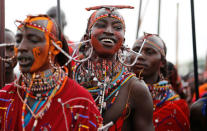 Maasai Moran athletes sing and dance as they arrive for the 2018 Maasai Olympics at the Sidai Oleng Wildlife Sanctuary, at the base of Mt. Kilimanjaro, near the Kenya-Tanzania border in Kimana, Kajiado, Kenya December 15, 2018. REUTERS/Thomas Mukoya