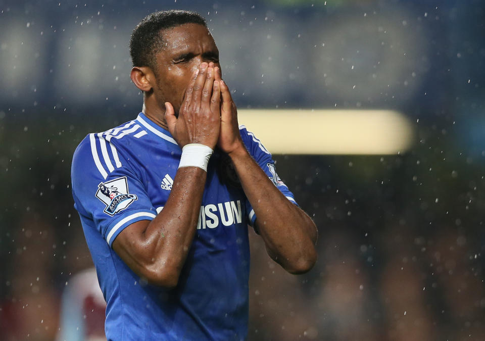 Chelsea's Samuel Eto'o holds his hands to his face after a chance to score a goal that he missed during the English Premier League soccer match between Chelsea and West Ham United at Stamford Bridge stadium in London, Wednesday, Jan. 29, 2014.(AP Photo/Alastair Grant)