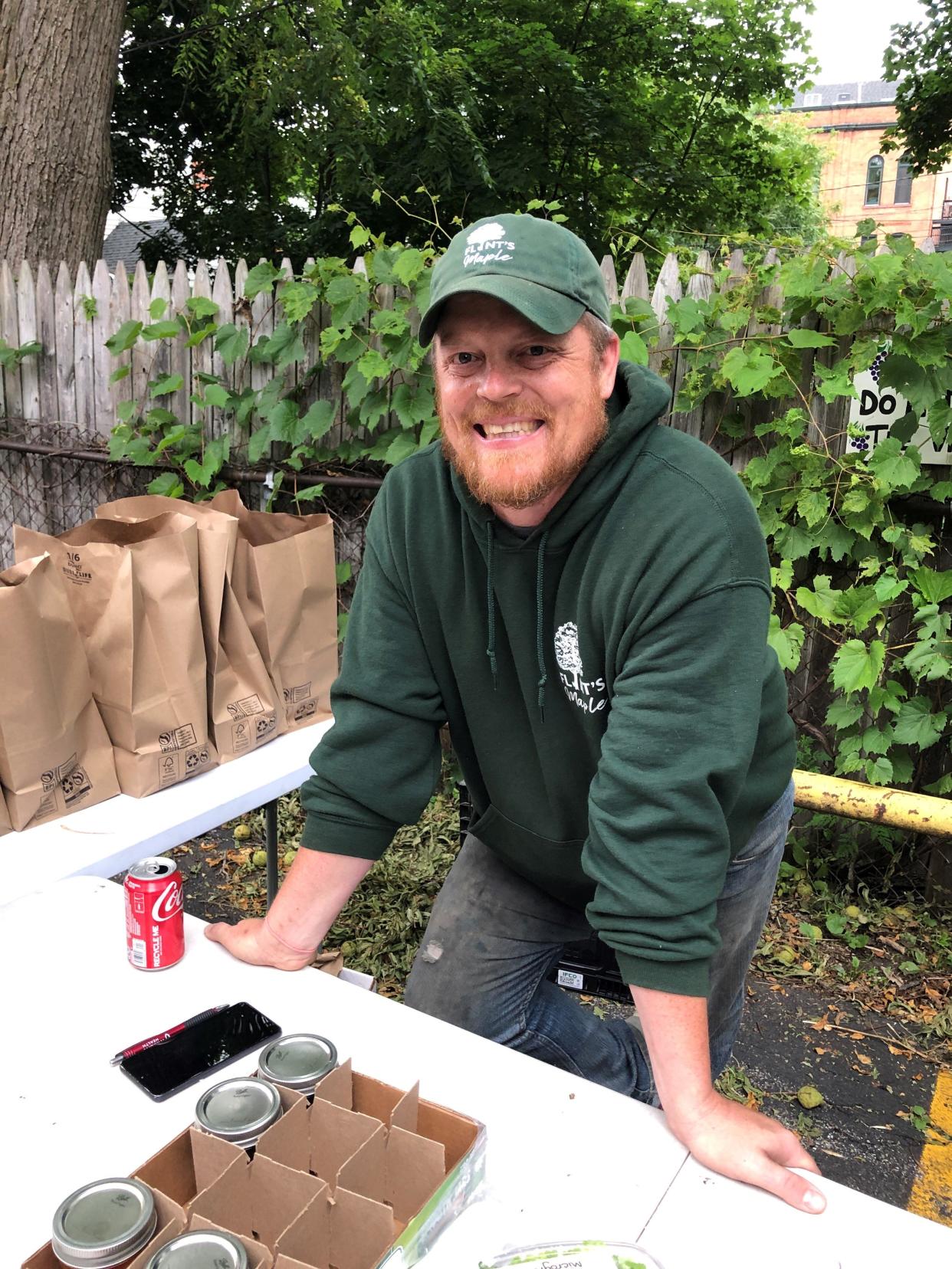 Chad Flint, shown here at a farmer's market, is co-owner of Homegrown and Handmade Market on Monroe Avenue.