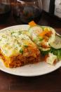 <p>A classic lasagna made easy.</p><p>Get the recipe from <a href="https://www.delish.com/cooking/recipe-ideas/recipes/a56239/crock-pot-lasagna-recipe/" rel="nofollow noopener" target="_blank" data-ylk="slk:Delish;elm:context_link;itc:0;sec:content-canvas" class="link ">Delish</a>. </p>