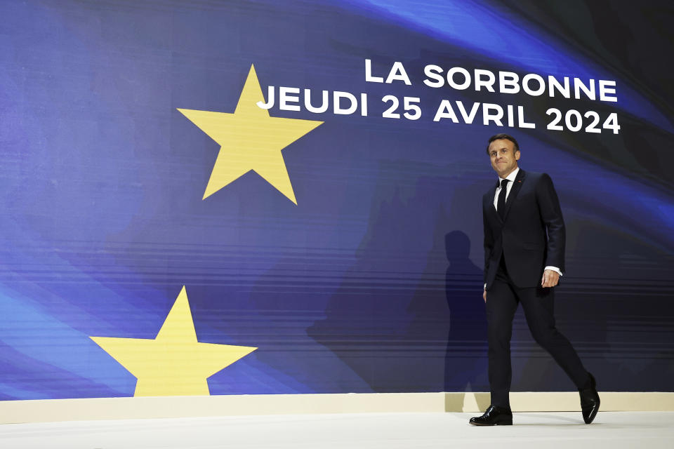 French President Emmanuel Macron arrives to deliver a speech on Europe in the amphitheater of the Sorbonne University, Thursday, April 25 in Paris. 2024. French President Emmanuel Macron will outline his vision for Europe as a more assertive global power at the backdrop of war in Ukraine, security, and economic challenges in a speech ahead of pivotal election for the European Parliament in June. (Christophe Petit Tesson, Pool via AP)