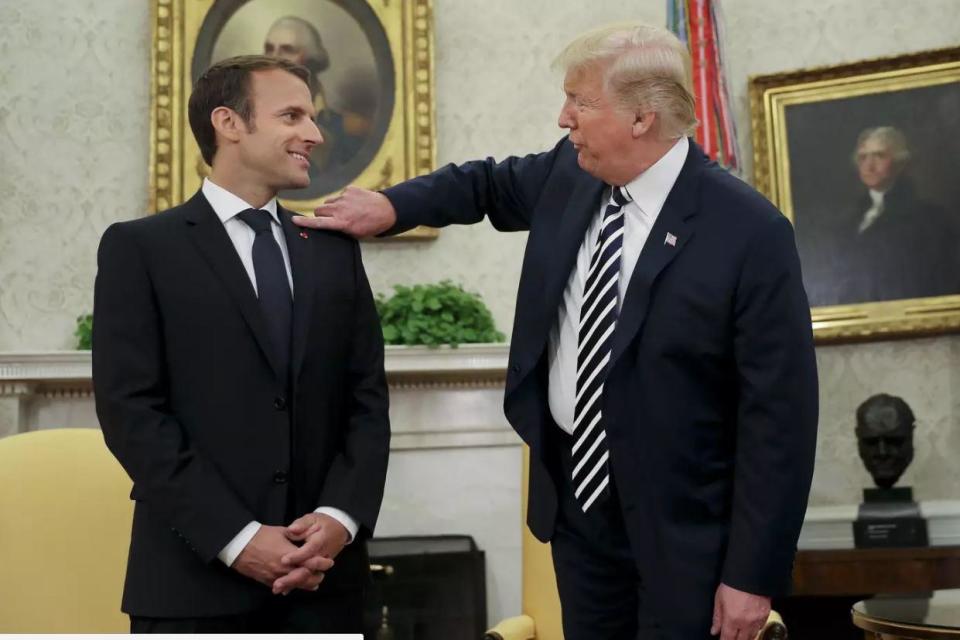 Donald Trump brushed dandruff off Emmanuel Macron's suit during the French president's US visit