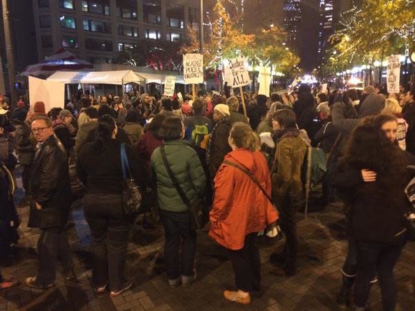 In this photo from Twitter user lilhalfpint79, people protest in Seattle on Mon. Nov, 24, 2014. 