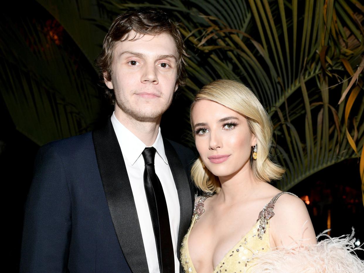 Evan Peters and Emma Roberts attend the 2018 Vanity Fair Oscar Party hosted by Radhika Jones at Wallis Annenberg Center for the Performing Arts on March 4, 2018 in Beverly Hills, California