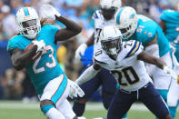 <p>Jay Ajayi #23 of the Miami Dolphins runs the ball during the game against the Los Angeles Chargers at the StubHub Center on September 17, 2017 in Carson, California. (Photo by Sean M. Haffey/Getty Images) </p>