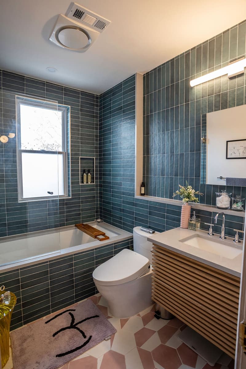 Blue tile in newly renovated bathroom.