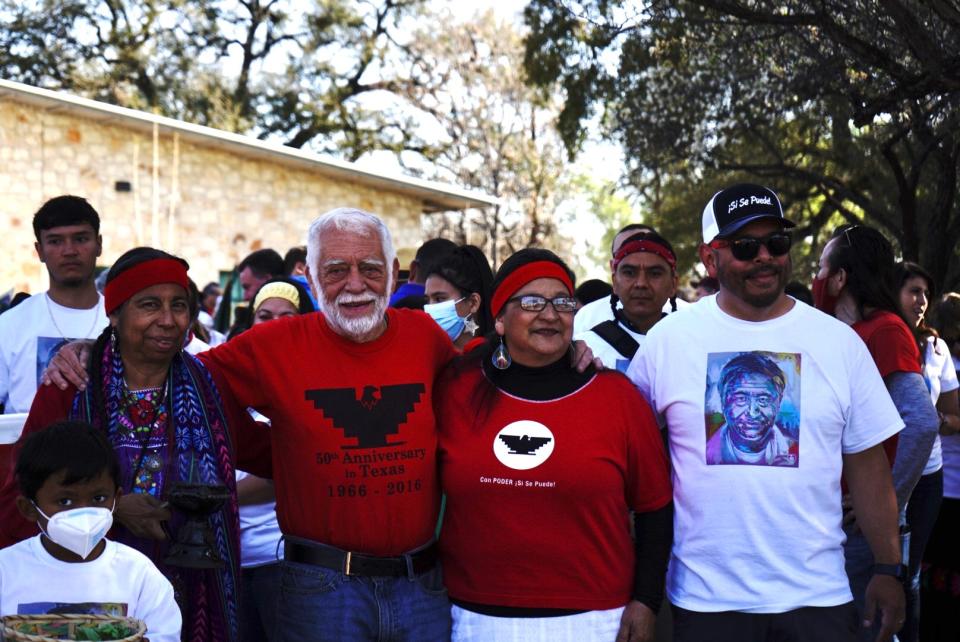 Jim Harrington, left, Susana Almanza, center, and Paul Saldaña, right, join Saturday's march in East Austin to honor civil rights activist and leader César Chávez.