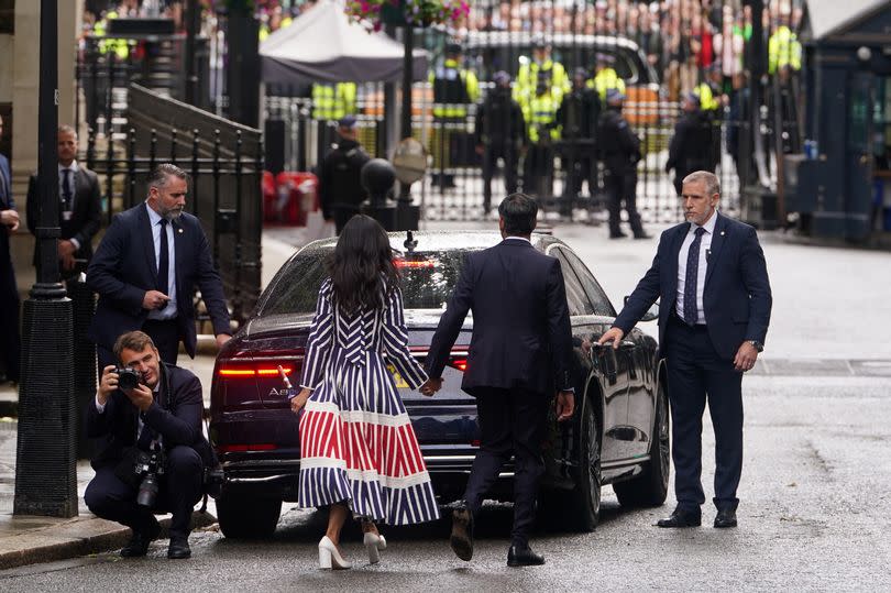 Rishi Sunak with his wife Akshata Murty leave Downing Street after Mr Sunak announced his resignation