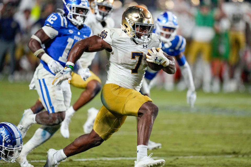 Notre Dame running back Audric Estime (7) runs for the winning score during the second half against Duke at Wallace Wade Stadium on Sept. 30.