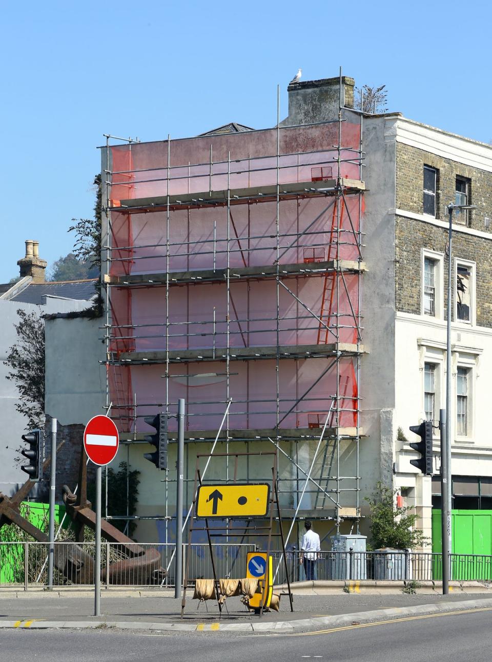 The painting was hidden by paint and scaffolding (PA)