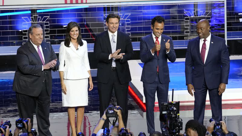 Republican presidential candidates from left, former New Jersey Gov. Chris Christie, former UN Ambassador Nikki Haley, Florida Gov. Ron DeSantis, businessman Vivek Ramaswamy and Sen. Tim Scott, R-S.C., stand on stage before a Republican presidential primary debate hosted by NBC News, Wednesday, Nov. 8, 2023, at the Adrienne Arsht Center for the Performing Arts of Miami-Dade County in Miami.