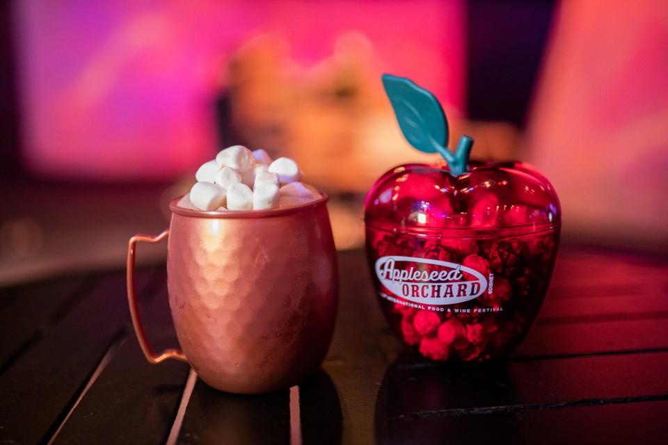 Highlights from the Appleseed Orchard marketplace in the Taste of Epcot International Food & Wine Festival include the Apple Blossom Sky (left) and Caramel-Apple Popcorn (right).