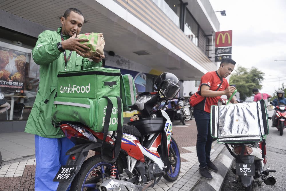 Food orders have gone up since the outbreak of Covid-19. — Picture by Miera Zulyana