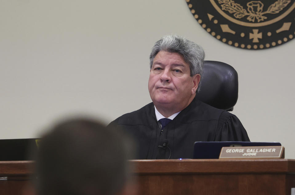 396th District Court Judge George Gallagher presides over the murder trial of former Fort Worth Police Officer Aaron Dean on Monday, Dec. 5, 2022, in Fort Worth, Texas. Dean, fatally shot Atatiana Jefferson, a Black woman through a window of her own Fort Worth home in in 2019. (Amanda McCoy/Star-Telegram via AP, Pool)