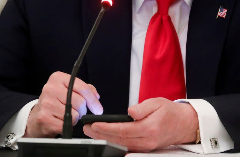 FILE PHOTO: U.S. President Trump hosts roundtable discussion on the reopening of U.S. economy at the White House in Washington