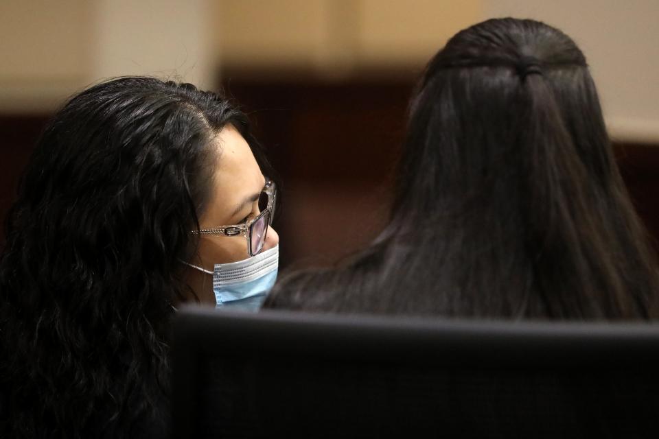 Katherine Magbanua speaks to her lawyer, Tara Kawass, during her sentencing hearing Friday, July 29, 2022 in Tallahassee, Fla. 