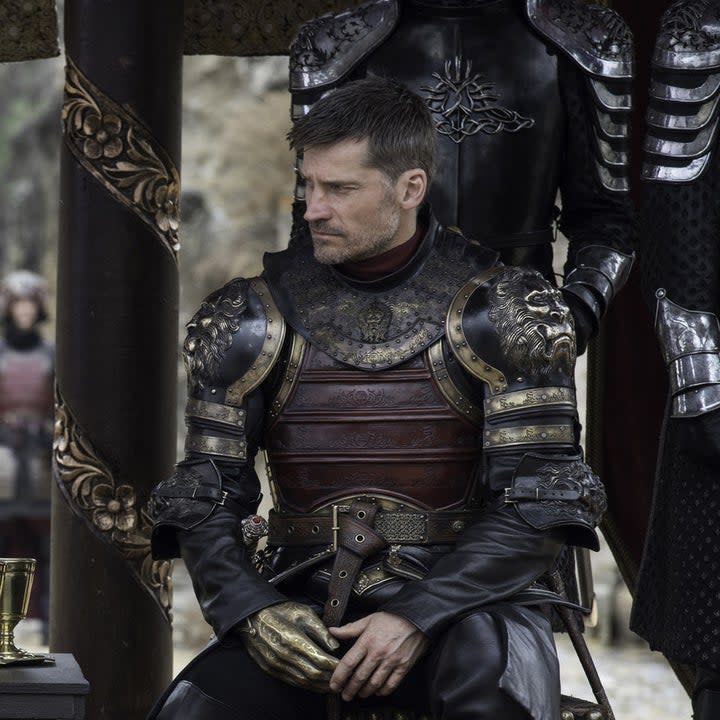 Nickolaj Coster-Waldau sits in a chair