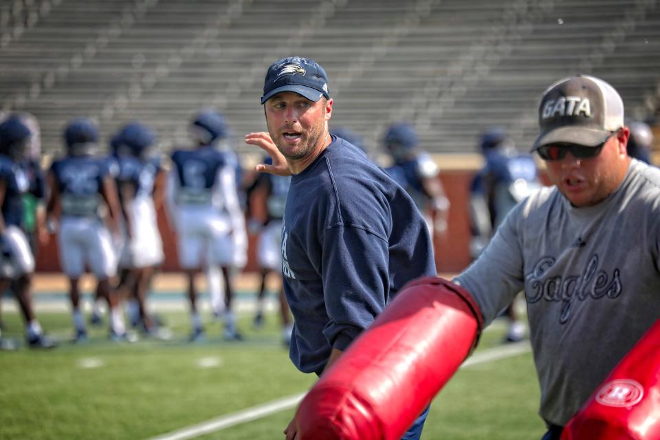 Georgia Southern linebackers coach Aaron Schwanz, center, during practice on Aug. 16, 2022 at Paulson Stadium in Statesboro.