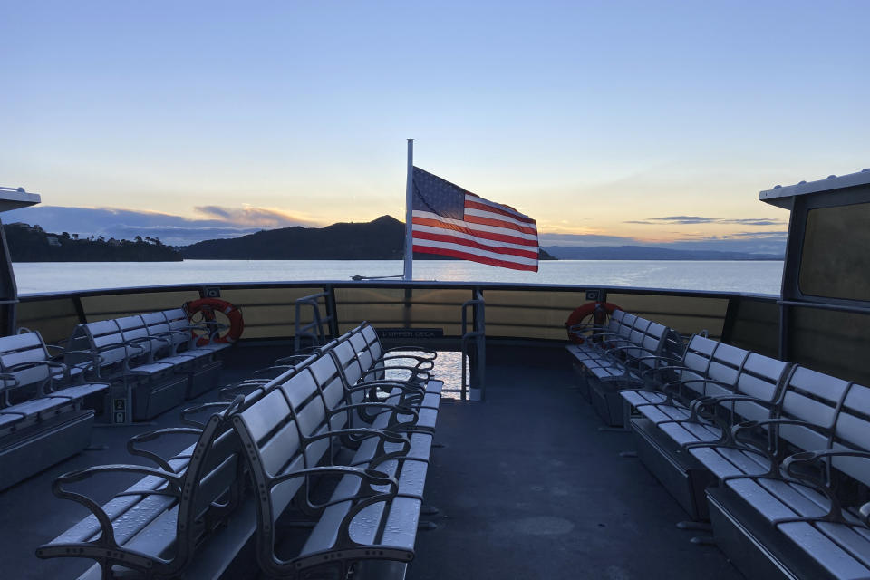 Empty seats are seen on the back of a Golden Gate Transit ferry making its way from Sausalito, Calif., to San Francisco on March 30, 2023. California's public transit agencies say they are running out of money, plagued by depleted ridership from the pandemic and soon-to-expire federal aid. But California's state government is having its own financial problems, leaving the fate of public transit agencies uncertain in this car-obsessed state. (AP Photo/Eric Risberg)